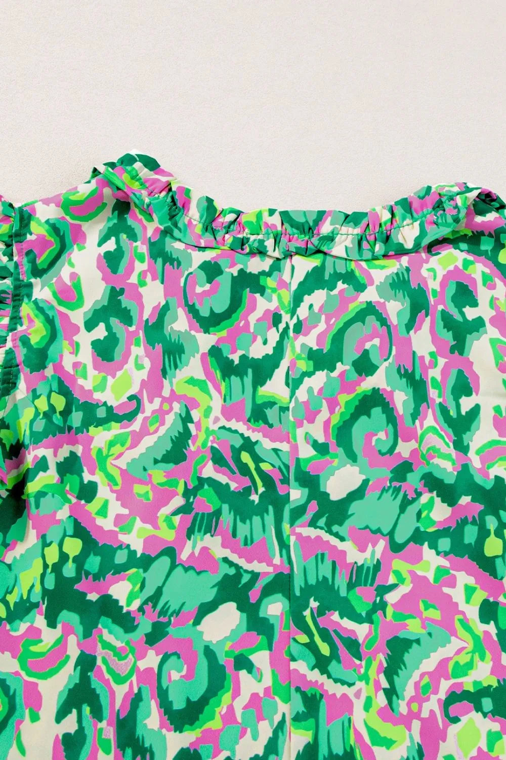Abstract Print Ruffled Trim Tie Neck Top Simply Love
