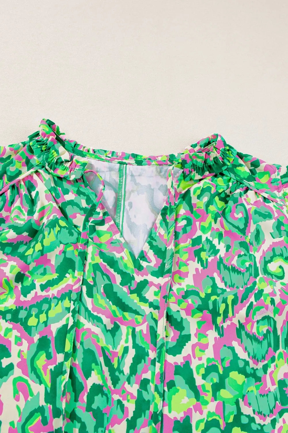 Abstract Print Ruffled Trim Tie Neck Top Simply Love