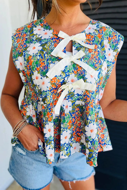 Floral Print Bow Applique Slit Sleeveless Peplum Blouse  DAME BOHEME