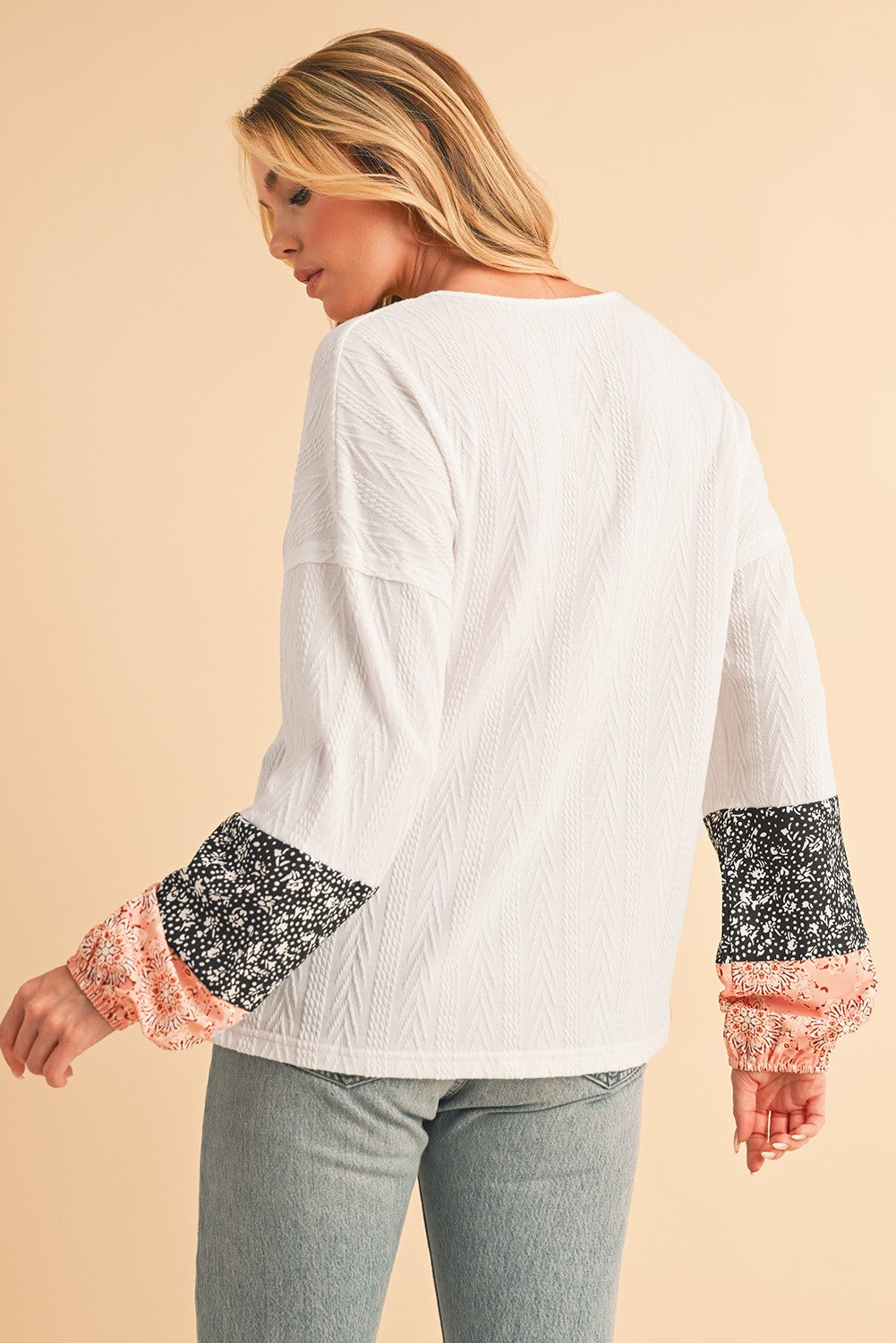 Floral Patchwork Sleeves Textured Drawstring V Neck Top SHEWIN INC.