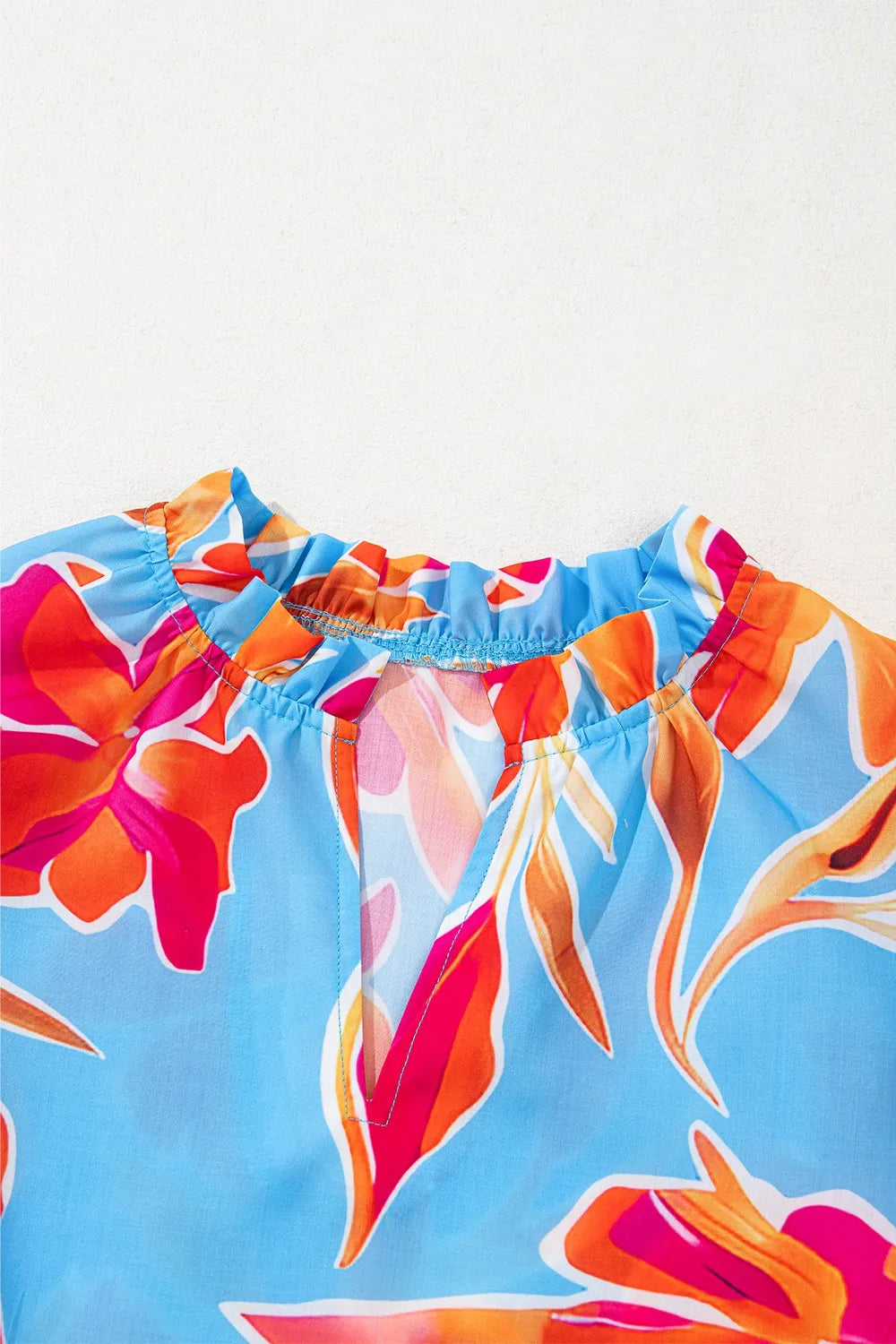 Floral Print Notched Pompom Trim Flutter Sleeve Blouse  DAME BOHEME