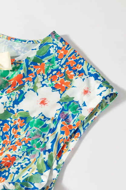 Floral Print Bow Applique Slit Sleeveless Peplum Blouse  DAME BOHEME