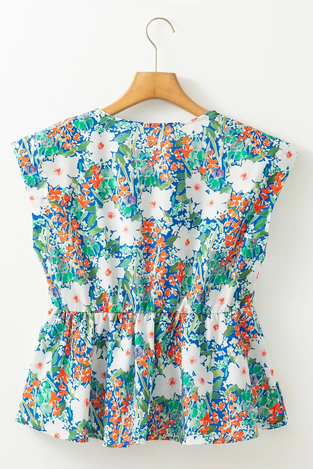 Floral Print Bow Applique Slit Sleeveless Peplum Blouse  DAME BOHEME