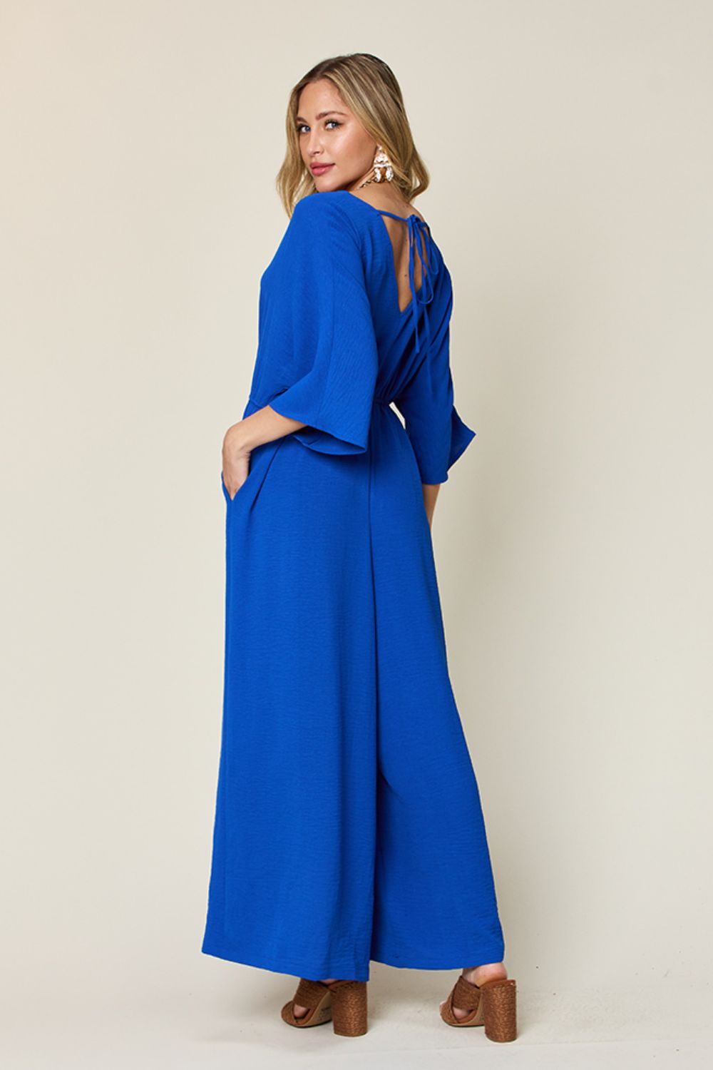 Surplice Wide Leg Jumpsuit Plus Size Trendsi