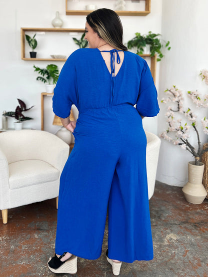 Surplice Wide Leg Jumpsuit Plus Size Trendsi