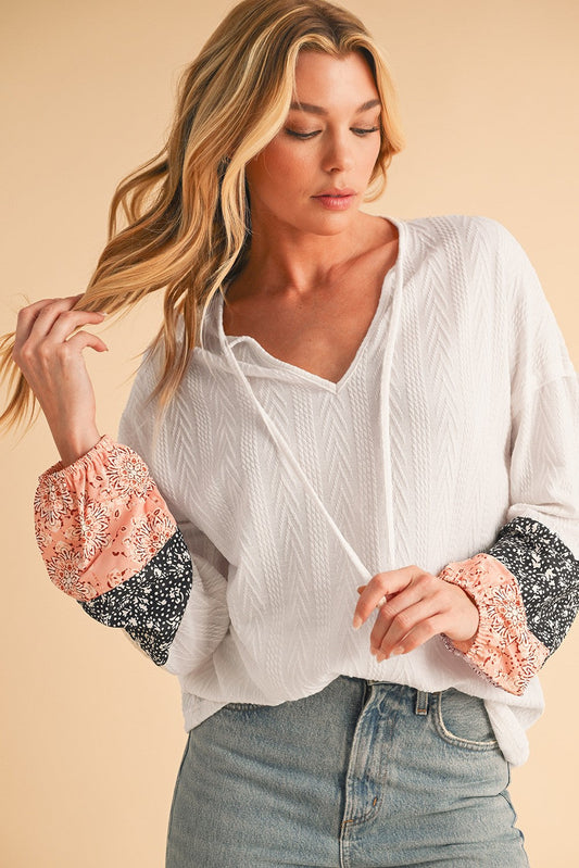 Floral Patchwork Sleeves Textured Drawstring V Neck Top SHEWIN INC.