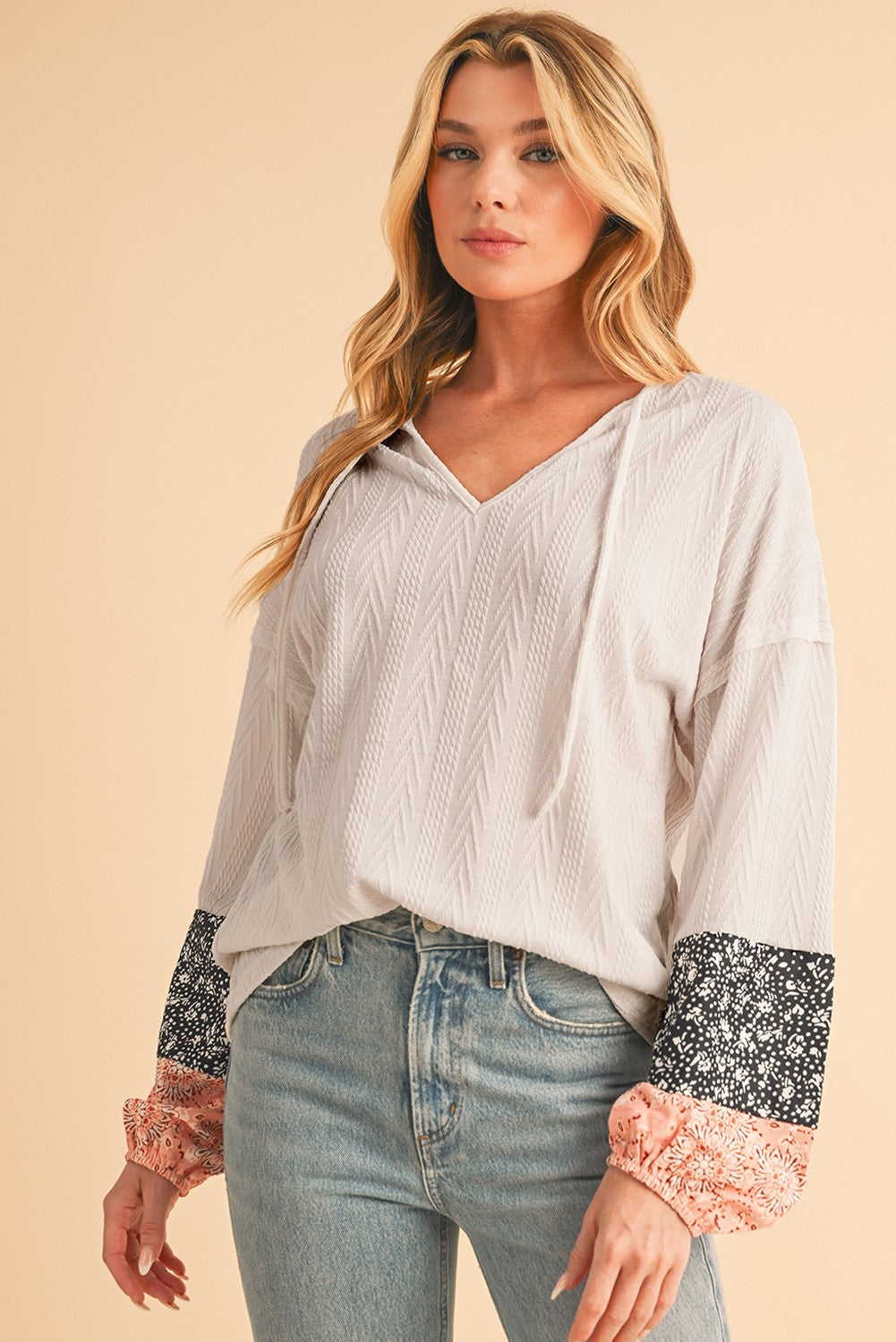 Floral Patchwork Sleeves Textured Drawstring V Neck Top SHEWIN INC.