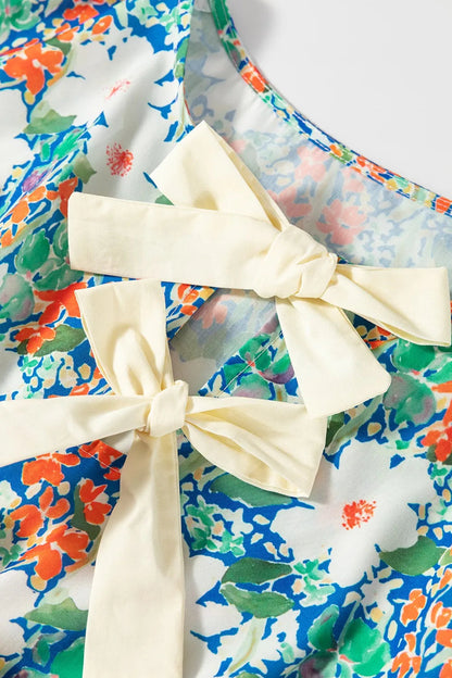 Floral Print Bow Applique Slit Sleeveless Peplum Blouse  DAME BOHEME